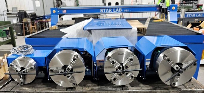 Rota-Cut rotary tube cutting attachment mounted on StarLab CNC plasma table